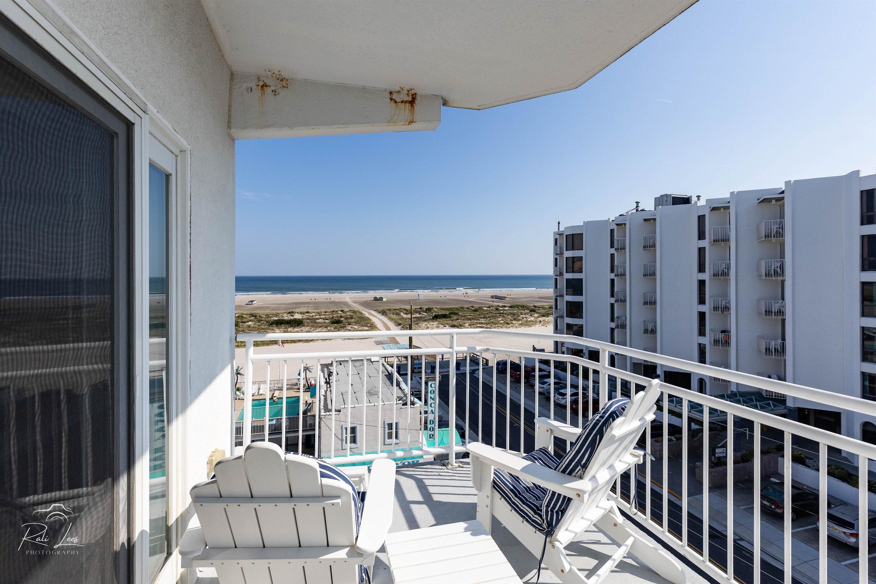503 East Stanton Road, Unit 403 Wildwood Crest, NJ 08260 - Photo 2 of 42 a view of a balcony with furniture
