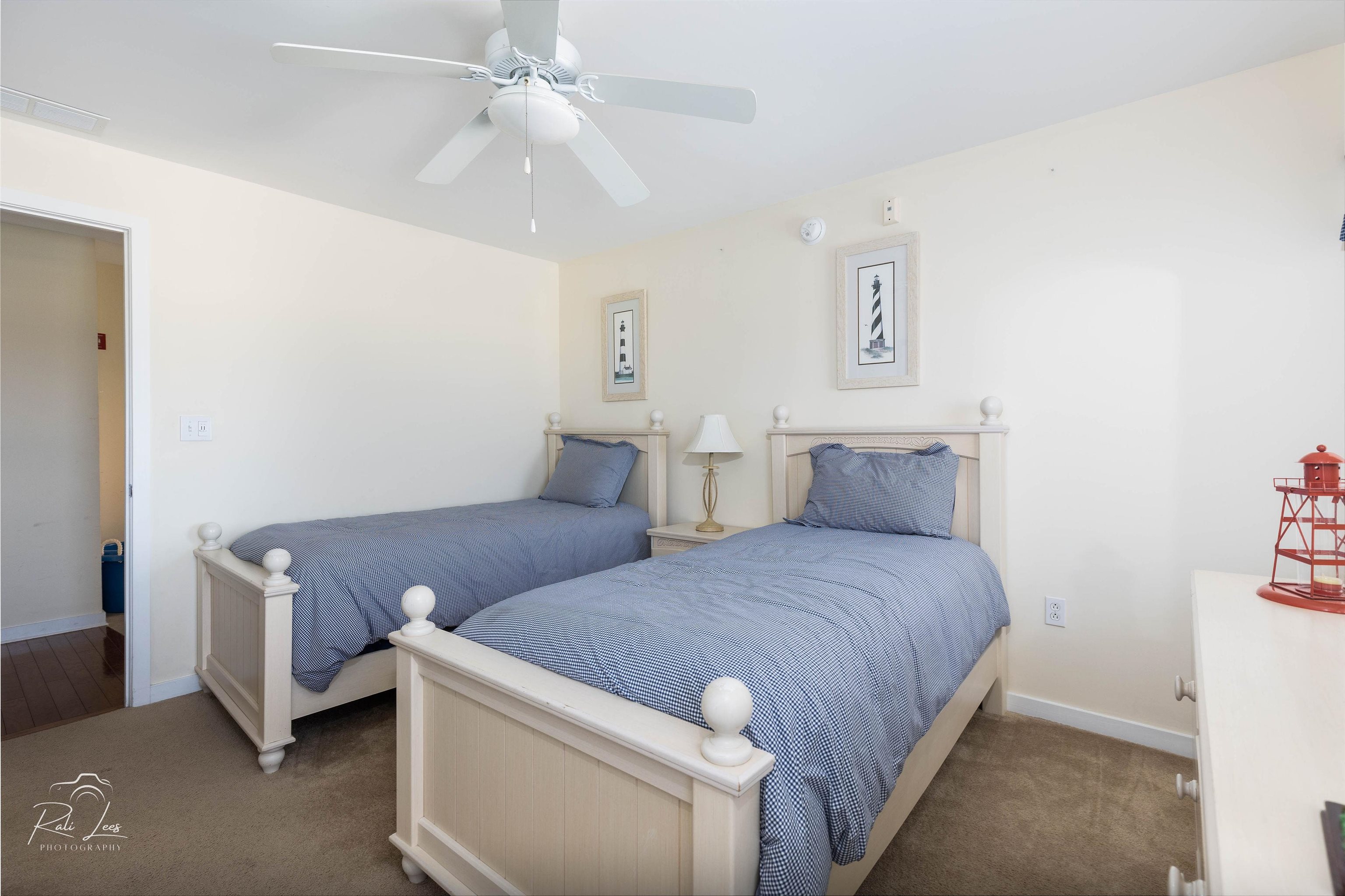 503 East Stanton Road, Unit 403 Wildwood Crest, NJ 08260 - Photo 23 of 42 a bedroom with a bed and a ceiling fan