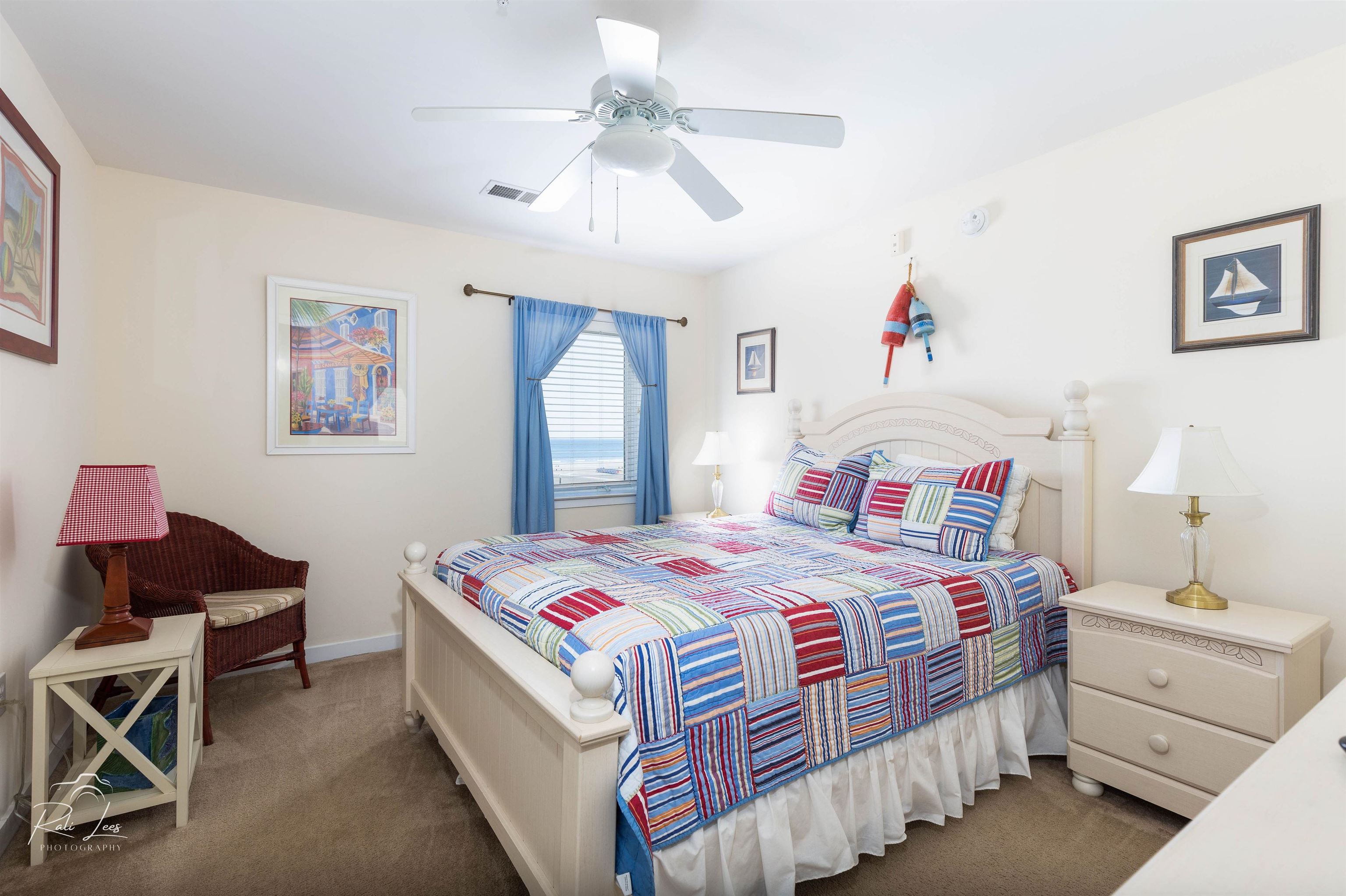 503 East Stanton Road, Unit 403 Wildwood Crest, NJ 08260 - Photo 24 of 42 a bedroom with a bed and a chandelier