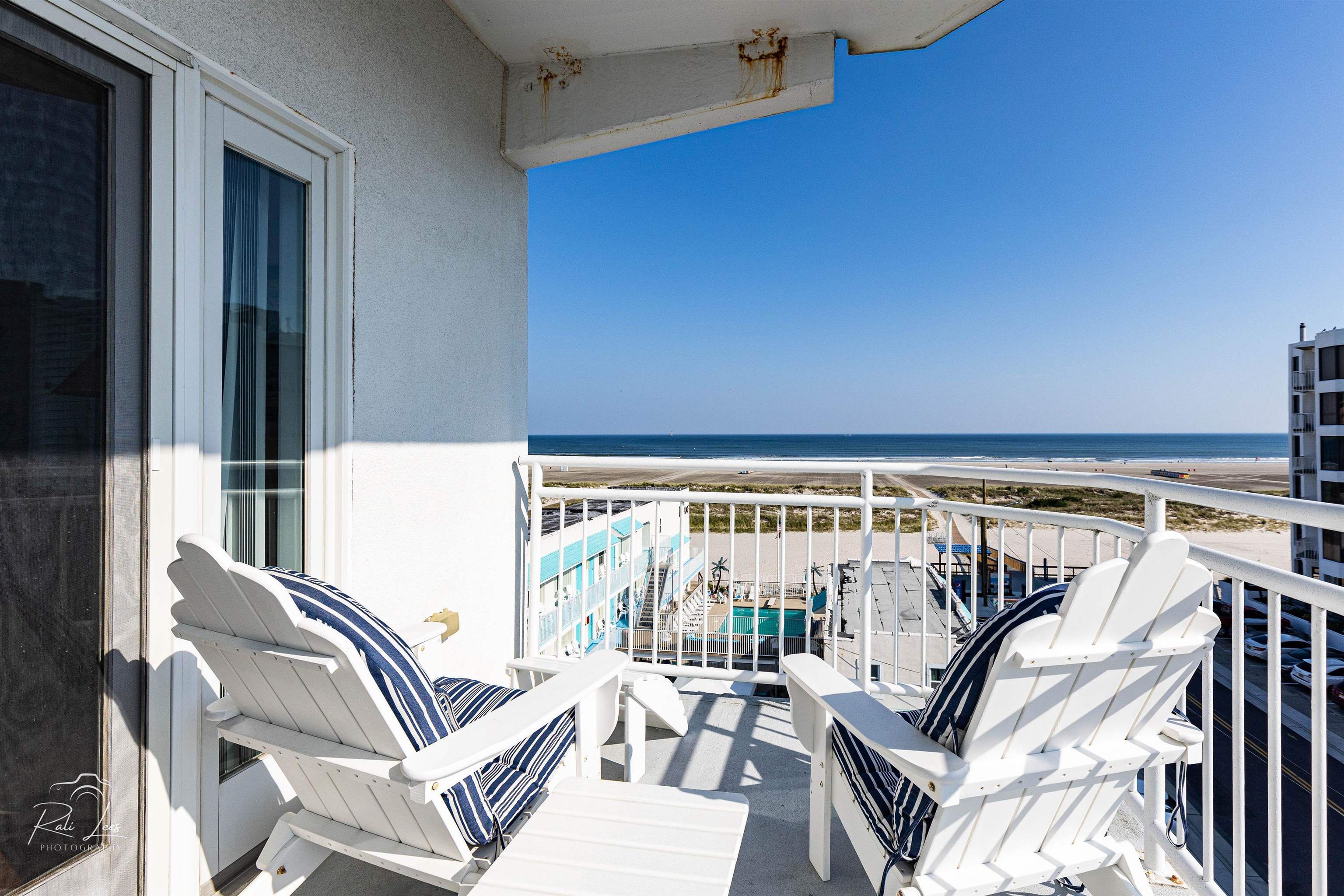503 East Stanton Road, Unit 403 Wildwood Crest, NJ 08260 - Photo 28 of 42 a view of a chairs and table in patio