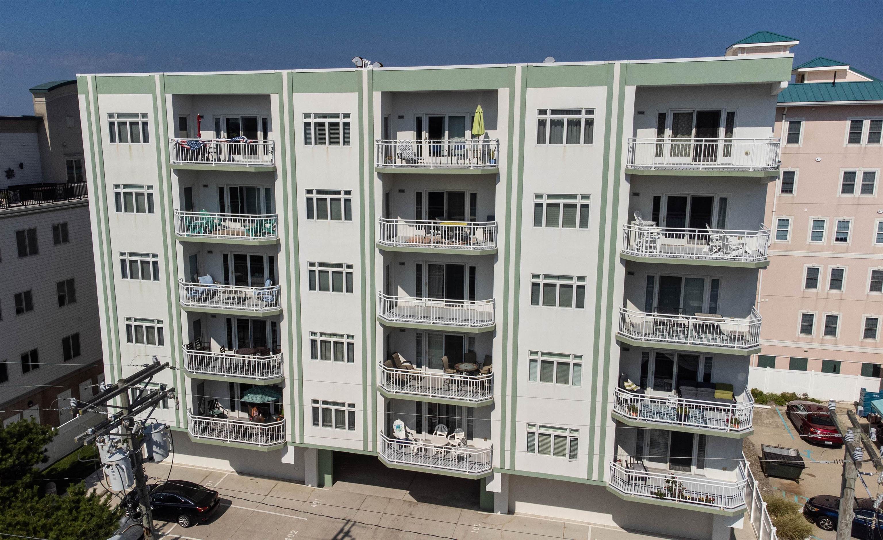 503 East Stanton Road, Unit 403 Wildwood Crest, NJ 08260 - Photo 36 of 42 a front view of a building with many windows