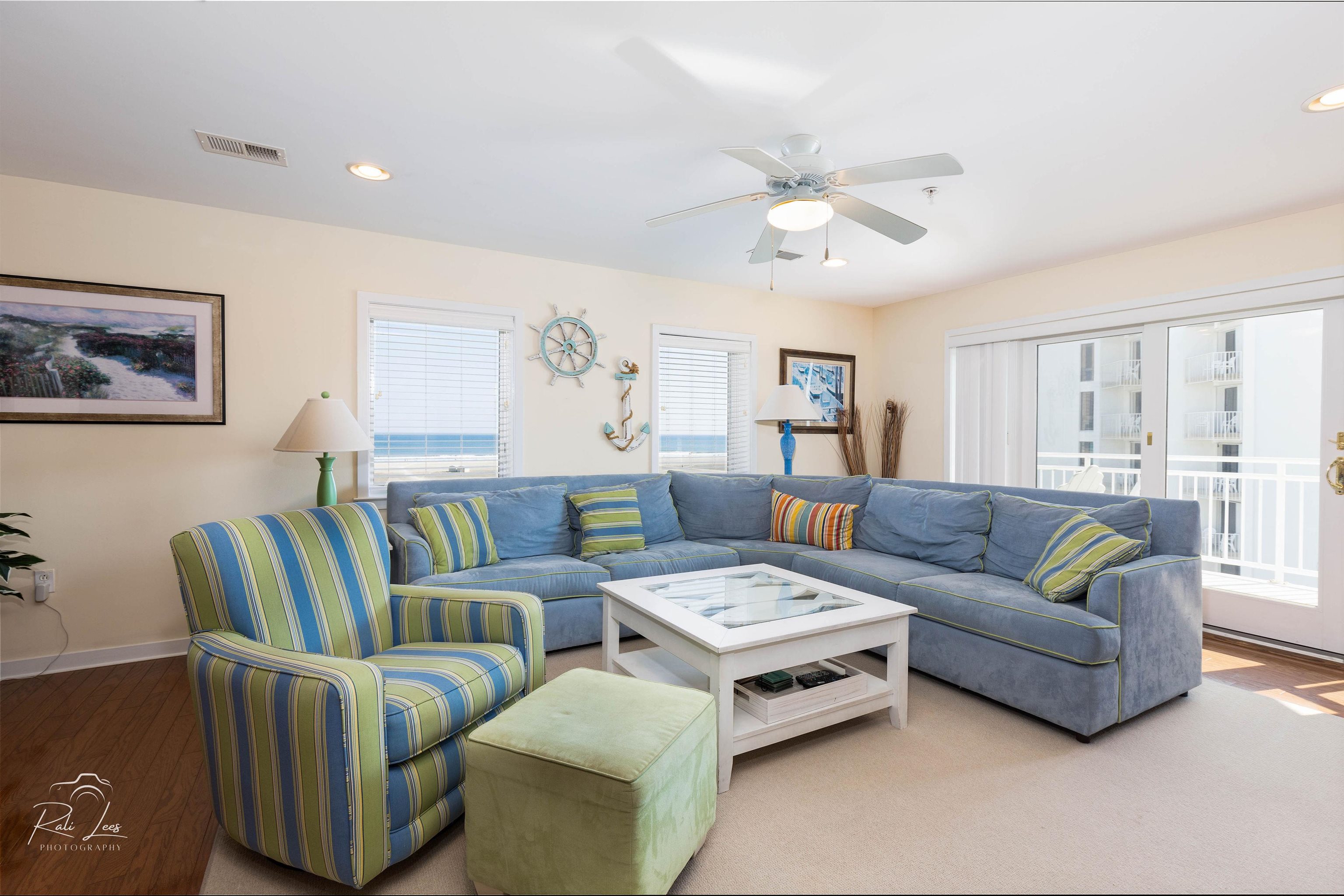 503 East Stanton Road, Unit 403 Wildwood Crest, NJ 08260 - Photo 6 of 42 a living room with furniture and a large window
