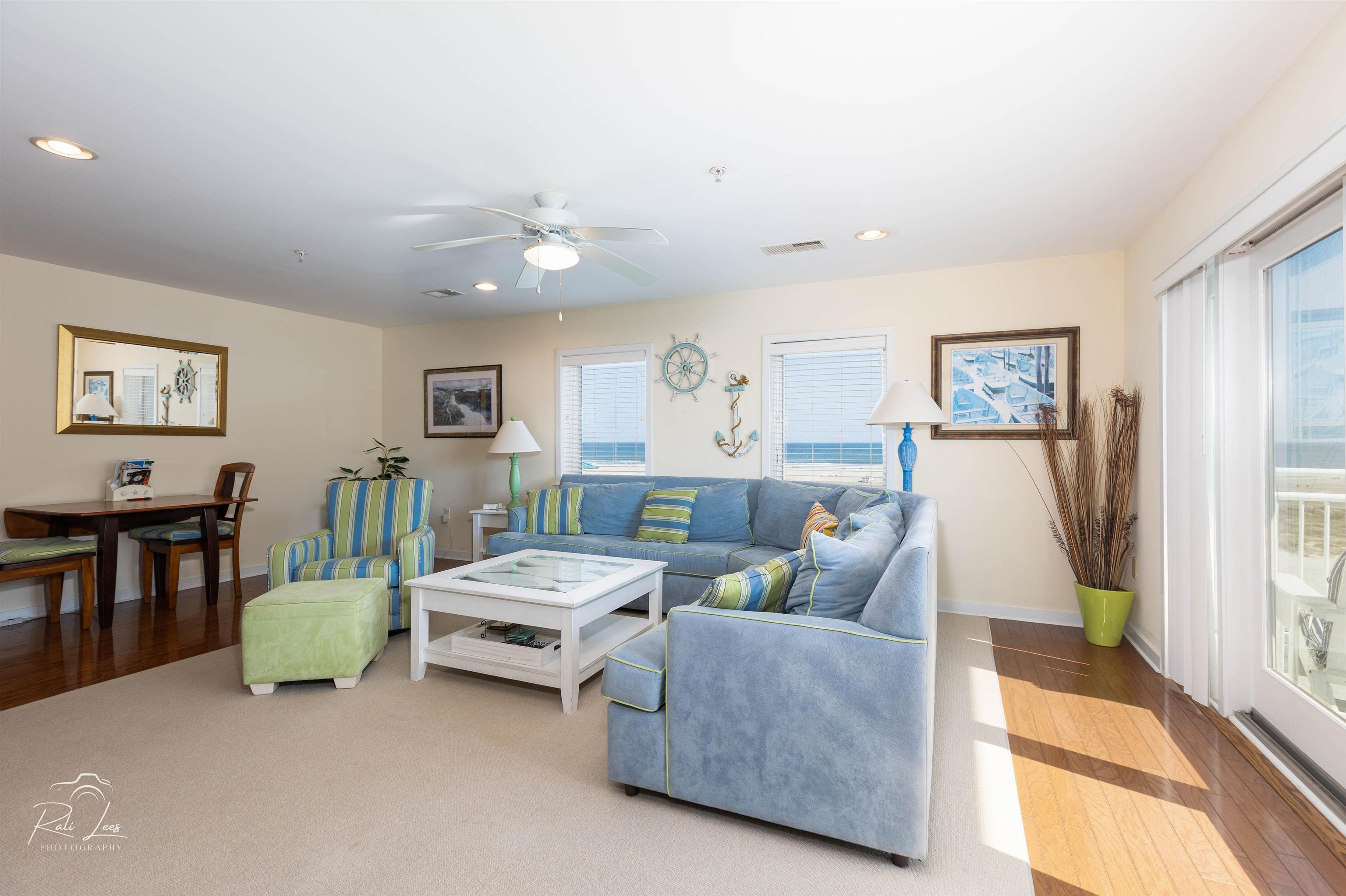 503 East Stanton Road, Unit 403 Wildwood Crest, NJ 08260 - Photo 8 of 42 a living room with furniture and a table