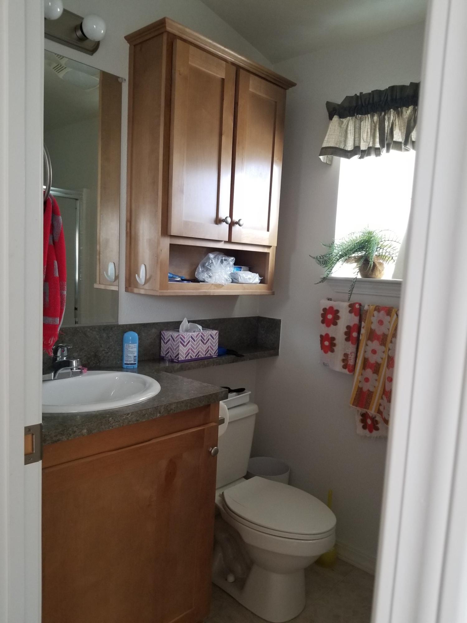 1500 Spa Road Niland, CA 92257 - Photo 12 of 24 a bathroom with a toilet sink and mirror