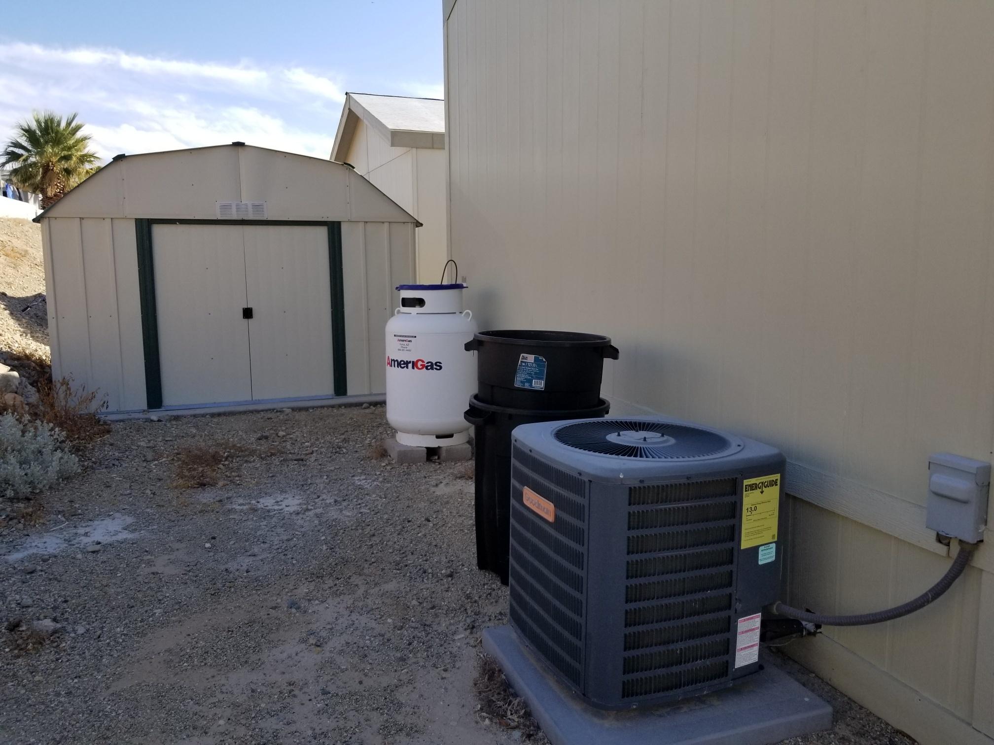 1500 Spa Road Niland, CA 92257 - Photo 16 of 24 a room that has a bed and a table in it