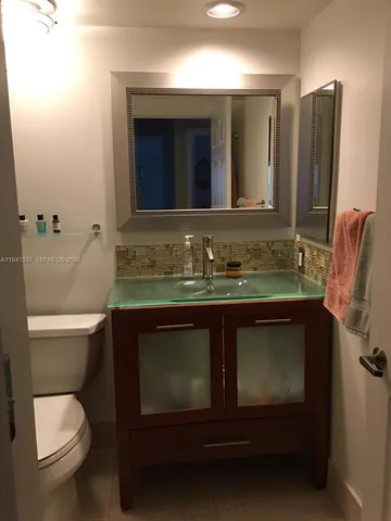 a bathroom with a sink and a toilet