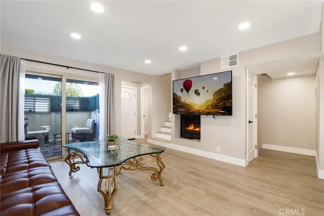 a view of a livingroom with furniture and a rug