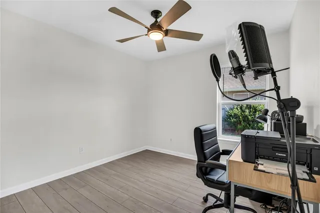 a view of workspace with wooden floor
