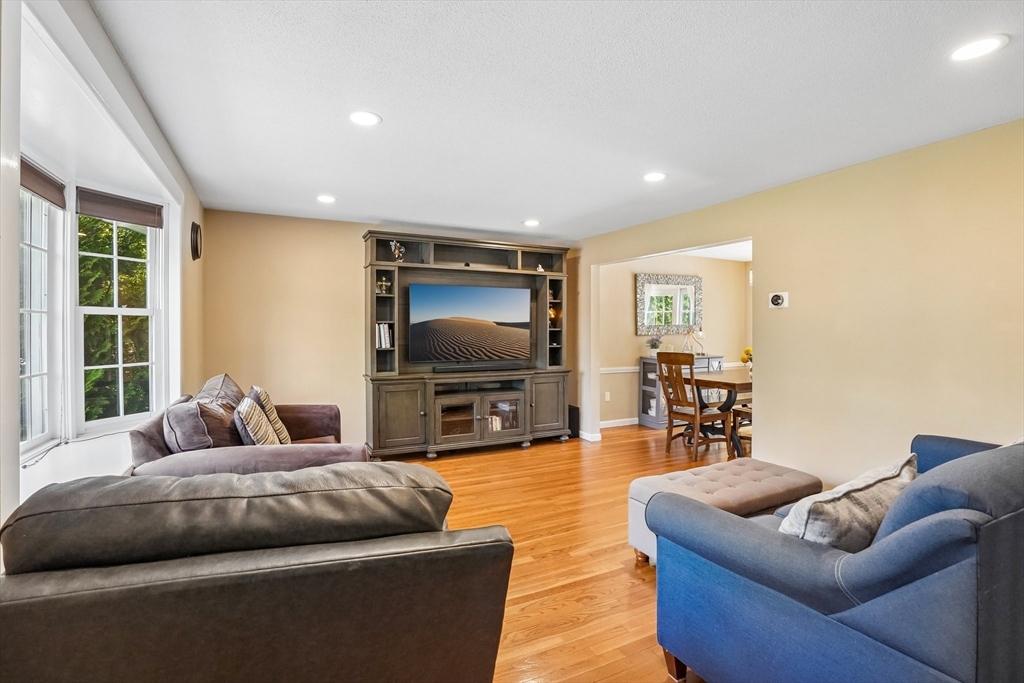 35 Westgate Road Framingham, MA 01701 - Photo 4 of 37 a living room with furniture and a flat screen tv