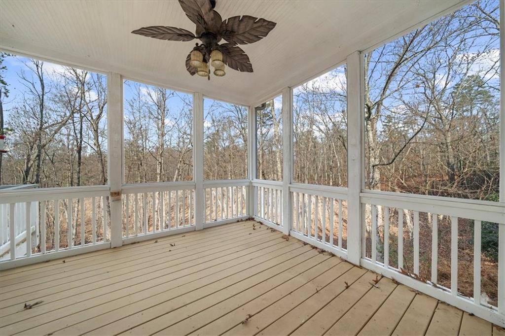 5488 Price Road Gainesville, GA 30506 - Photo 21 of 55 a view of a balcony with wooden floor