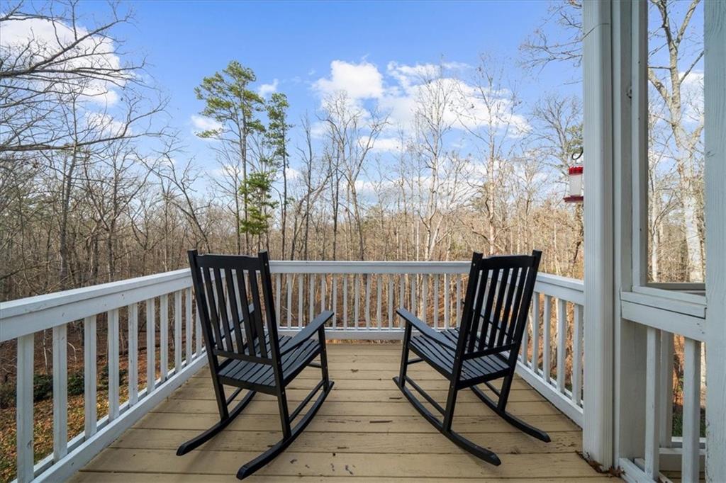 5488 Price Road Gainesville, GA 30506 - Photo 24 of 55 a view of a balcony with furniture