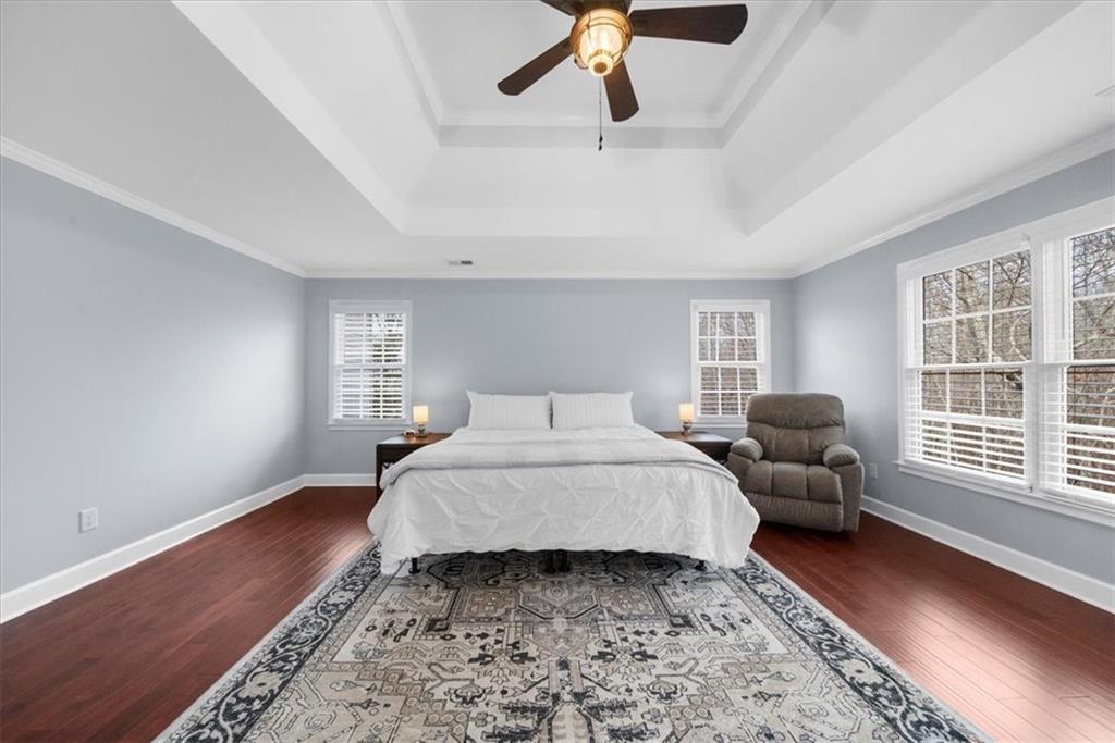 5488 Price Road Gainesville, GA 30506 - Photo 30 of 55 a bed room with a bed and a couch