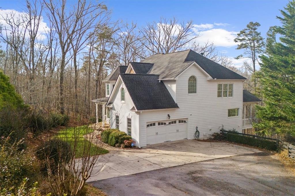 5488 Price Road Gainesville, GA 30506 - Photo 4 of 55 a view of a house with a yard