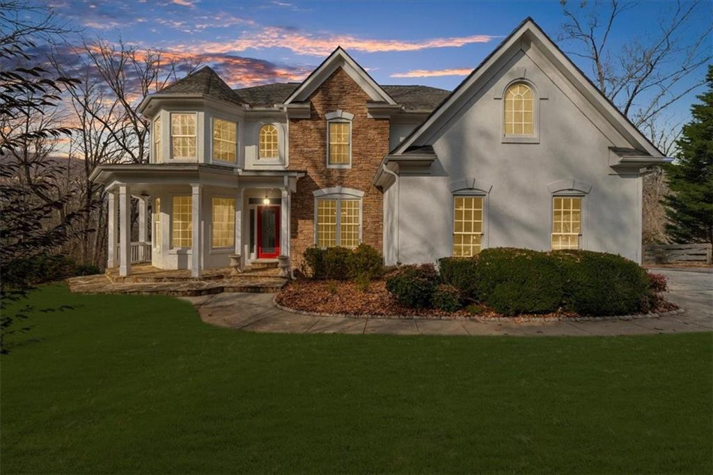 5488 Price Road Gainesville, GA 30506 - Photo 53 of 55 a front view of a house with a yard