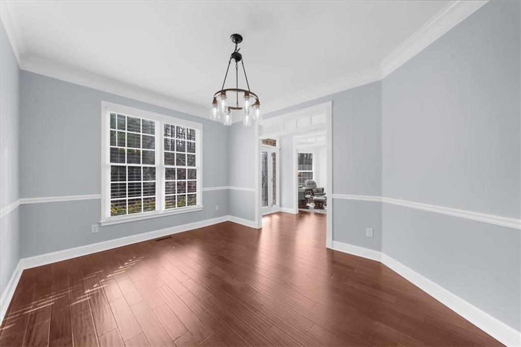 5488 Price Road Gainesville, GA 30506 - Photo 9 of 55 a view of a livingroom with wooden floor and a window
