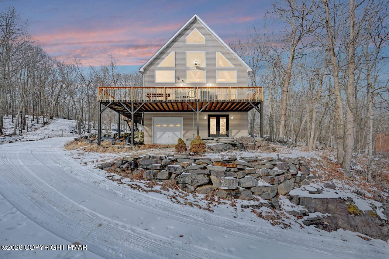 325 Chestnut Road East Stroudsburg, PA 18302 - Photo 1 of 50 a view of a dinning table and chairs in the patio
