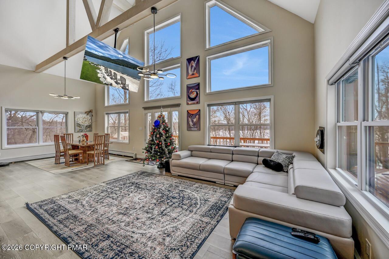 325 Chestnut Road East Stroudsburg, PA 18302 - Photo 12 of 50 a living room with furniture or couch and a wooden floor
