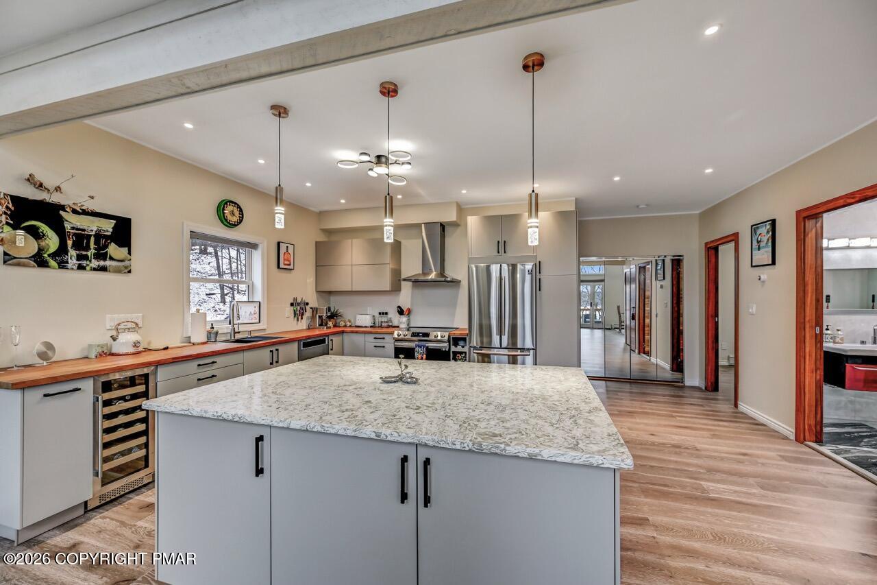 325 Chestnut Road East Stroudsburg, PA 18302 - Photo 14 of 50 a kitchen with stainless steel appliances granite countertop a sink a refrigerator and a stove