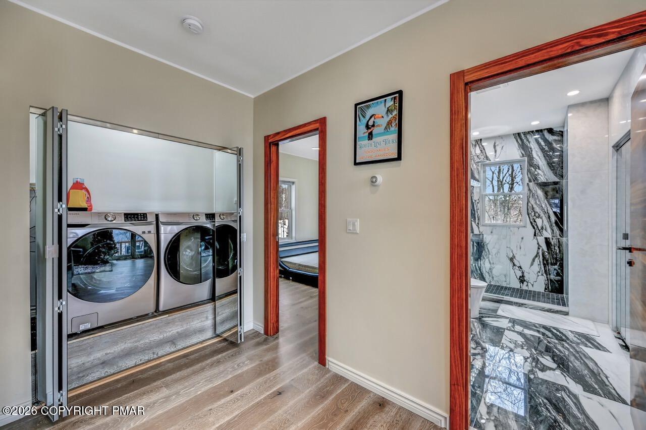 325 Chestnut Road East Stroudsburg, PA 18302 - Photo 22 of 50 a view of a hallway with washer and dryer