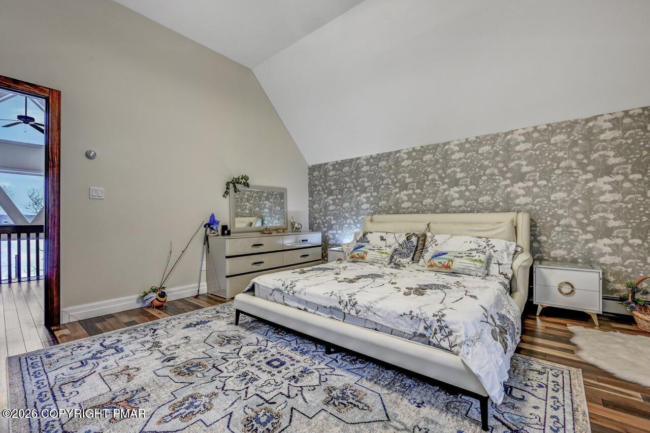 325 Chestnut Road East Stroudsburg, PA 18302 - Photo 36 of 50 a bedroom with a bed and a dresser in it