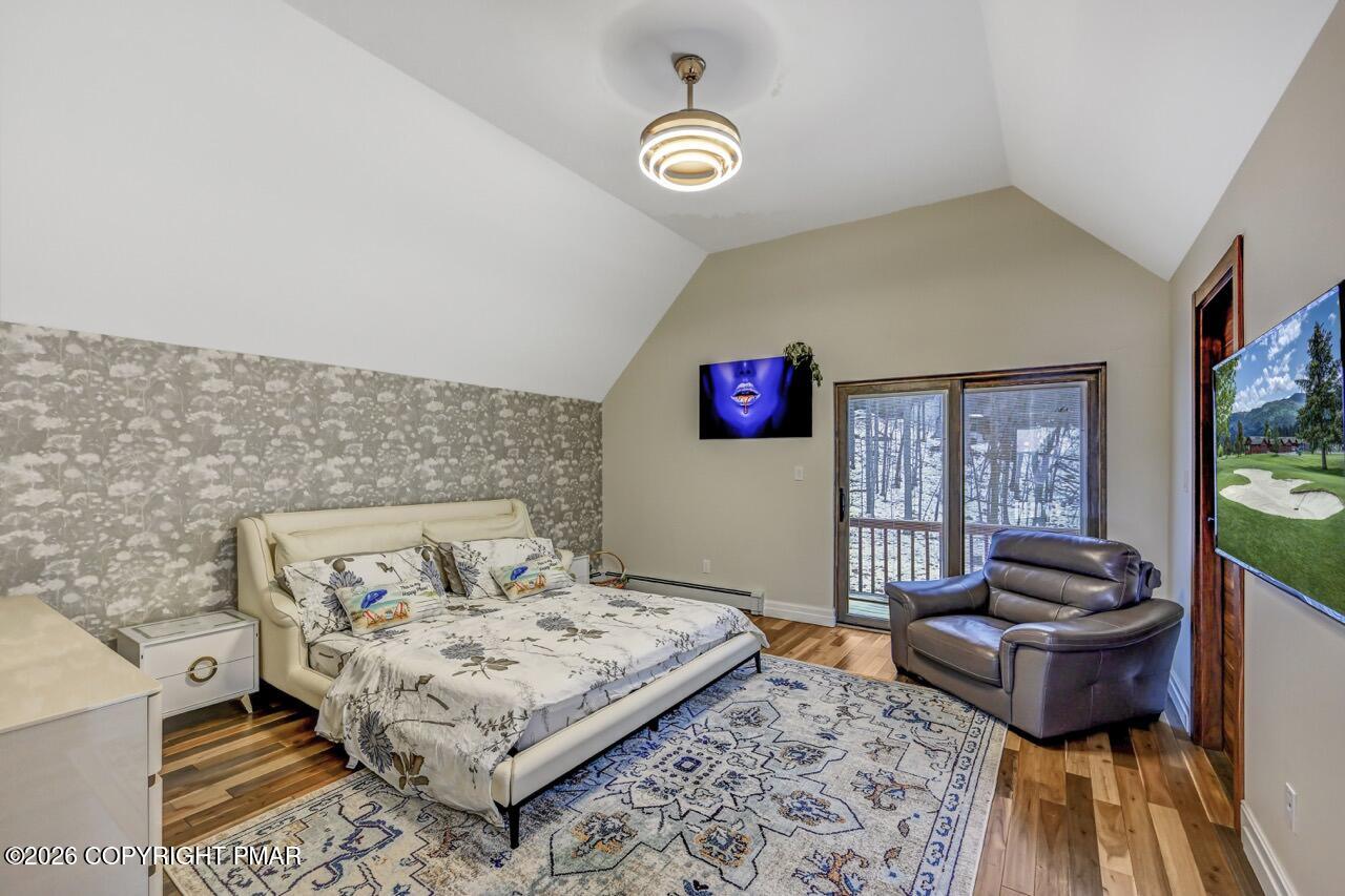 325 Chestnut Road East Stroudsburg, PA 18302 - Photo 38 of 50 a living room with furniture and a flat screen tv