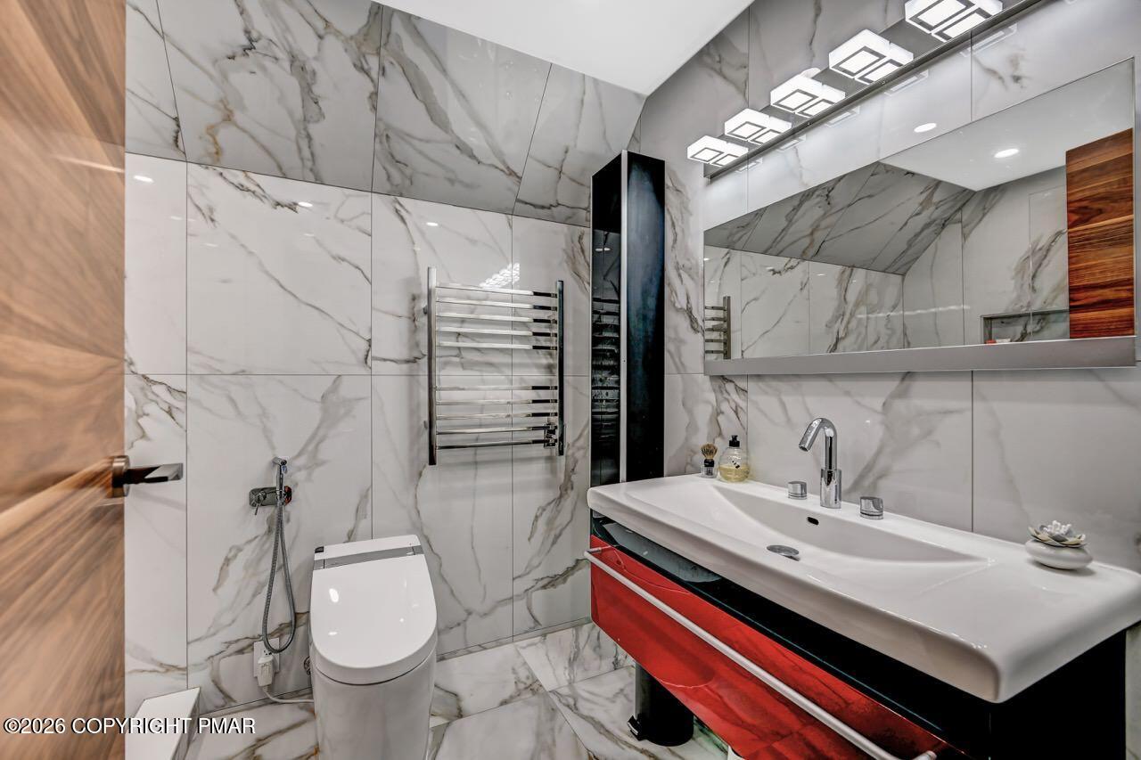 325 Chestnut Road East Stroudsburg, PA 18302 - Photo 43 of 50 a bathroom with a sink and a mirror