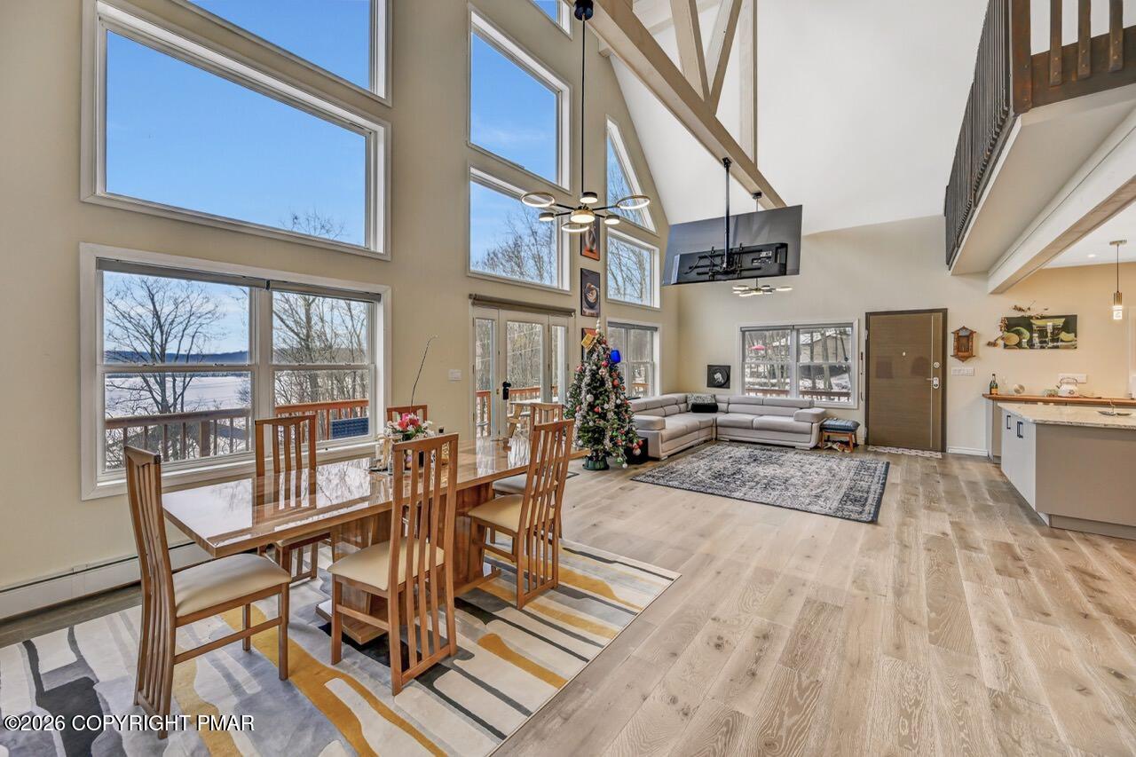325 Chestnut Road East Stroudsburg, PA 18302 - Photo 9 of 50 a view of a dining room with furniture and a floor to ceiling window