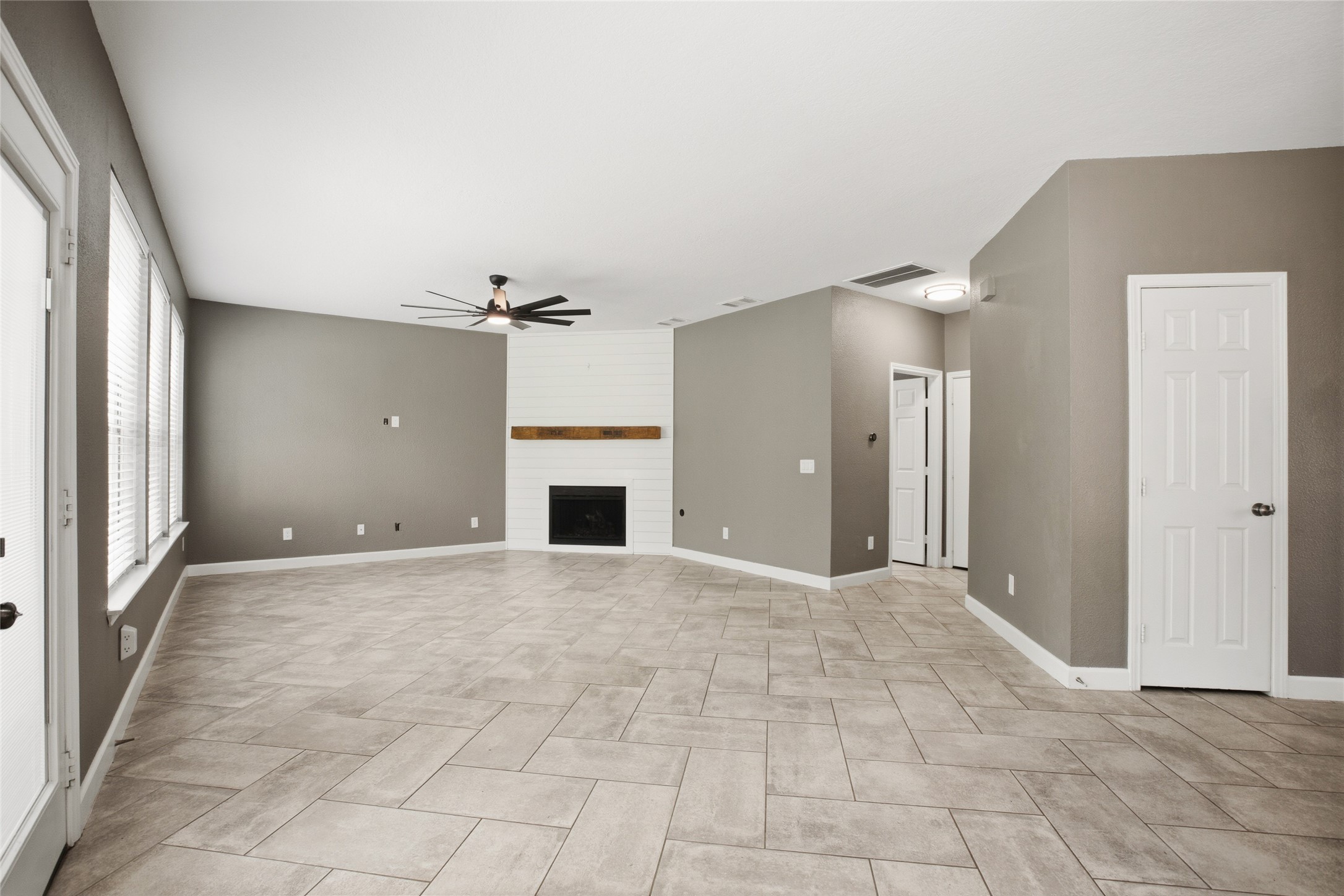 20907 Nettlebrook Lane Katy, TX 77450 - Photo 16 of 46 The family room settles around a fireplace that brings a natural sense of warmth and focus to the space where it easily becomes the everyday gathering place.