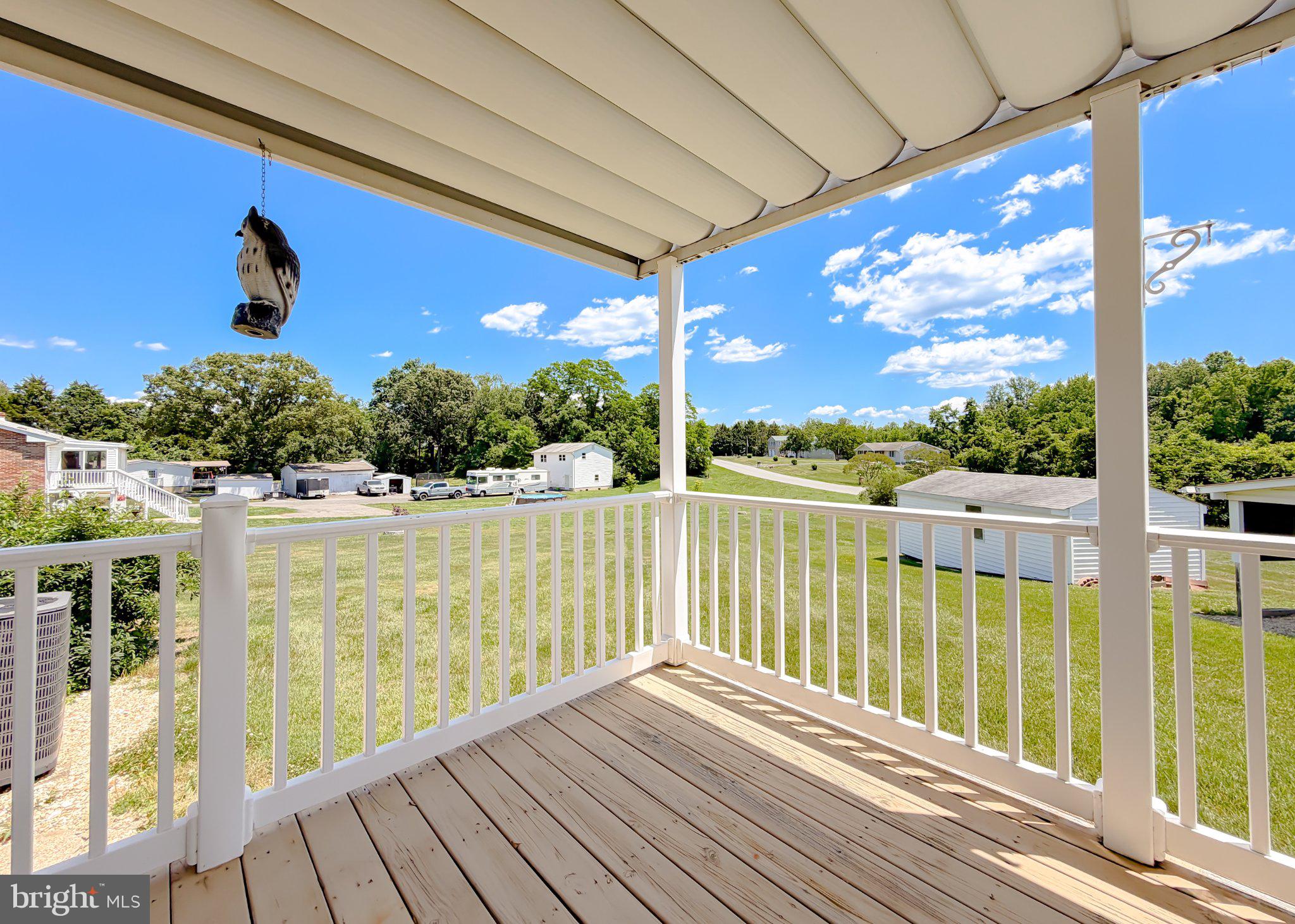 23230 Colton Point Road Avenue, MD 20609 - Photo 60 of 63 Sunny balcony with scenic views.