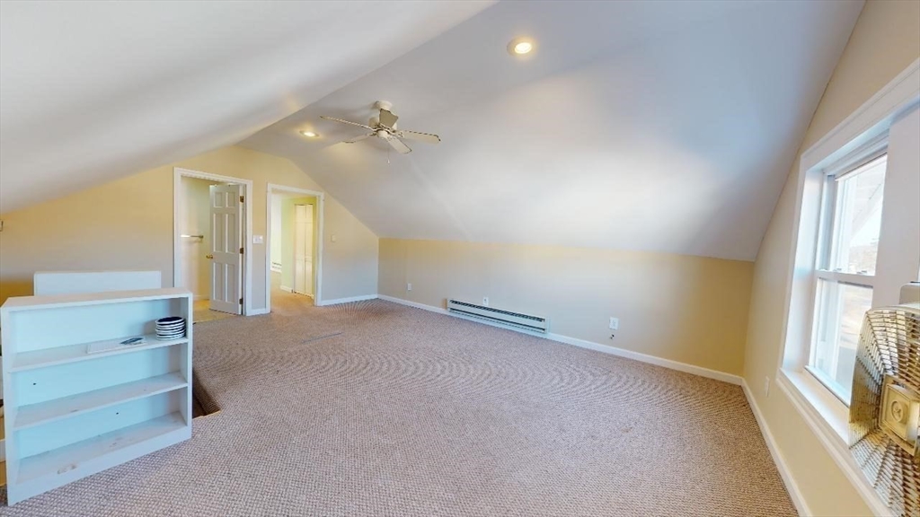 17 Gorham Road, Unit 2 Medford, MA 02155 - Photo 24 of 37 wooden floor in an empty room with a window