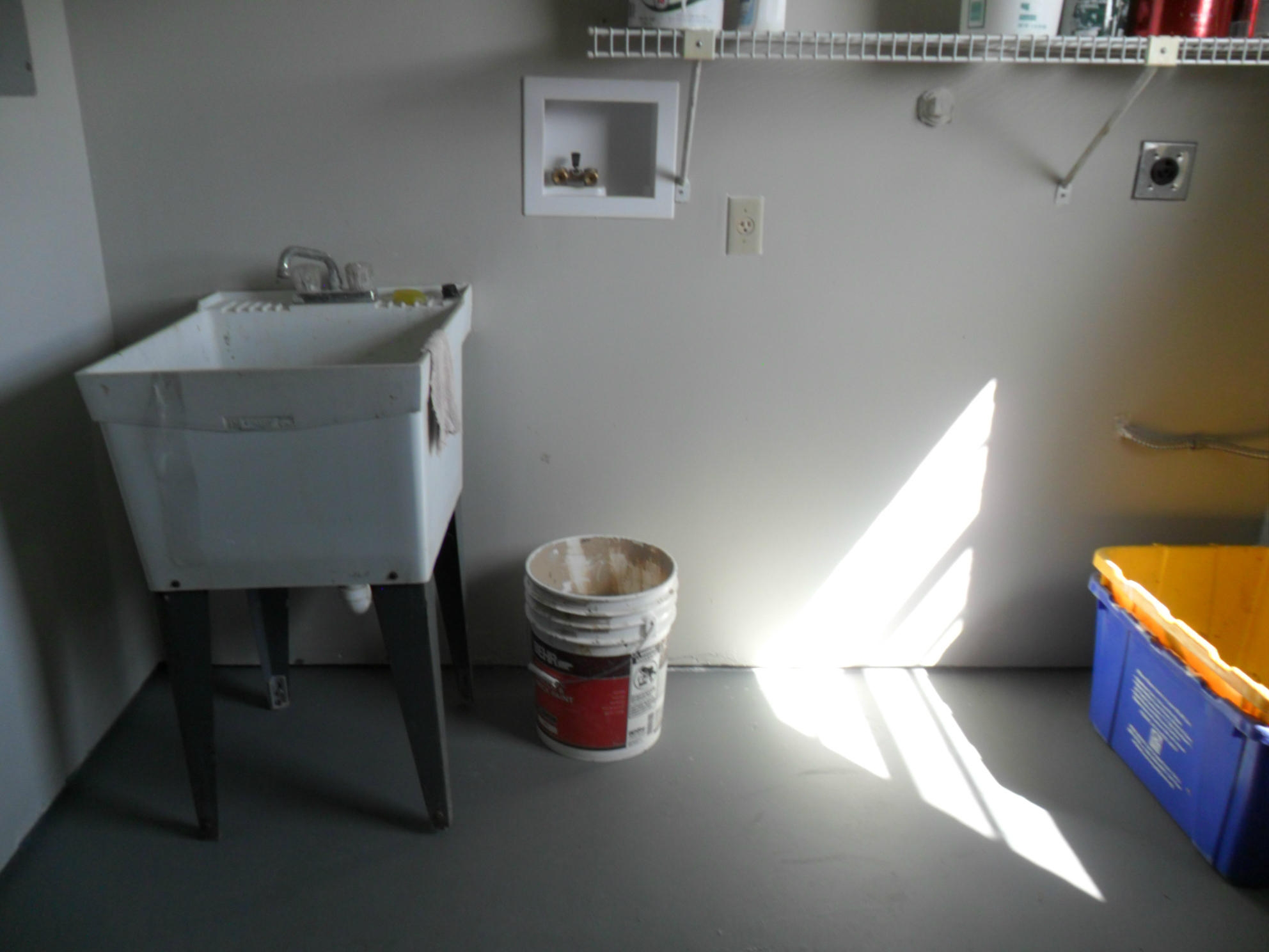 6311 Lasalle Road Delray Beach, FL 33484 - Photo 29 of 34 a room with a chair and a potted plant