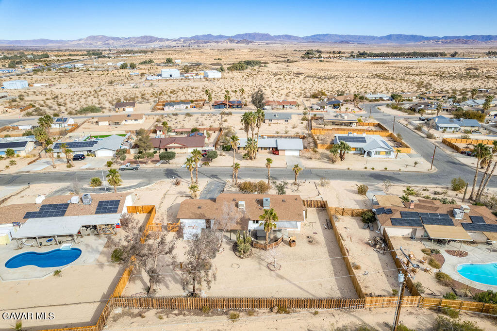 73843 White Sands Drive Twentynine Palms, CA 92277 - Photo 5 of 32 an aerial view of residential building and lake view