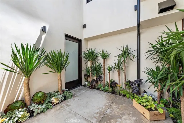 a view of a house with a street from a window