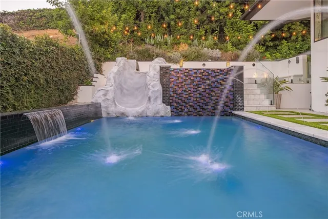 a view of an outdoor space with lounge chair