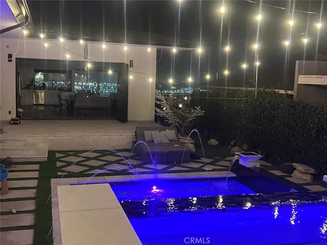 a room with red chairs and tables