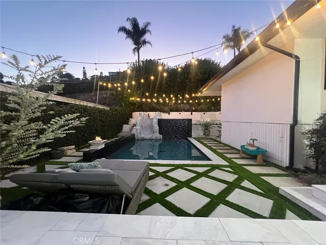 a roof deck view with sitting space