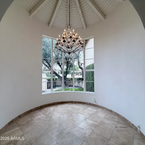 a view of a kitchen with a sink and cabinets