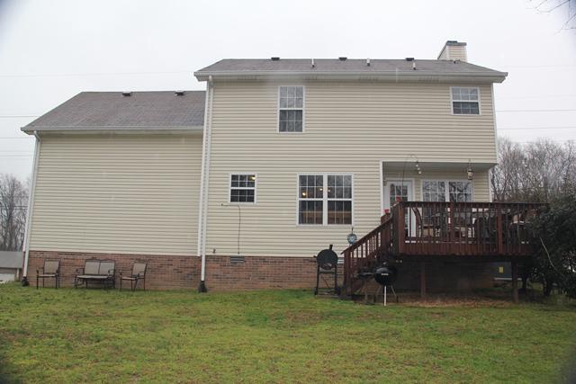 1682 Windriver Road Clarksville, TN 37042 - Photo 17 of 19 Back view of home with large wooden deck.