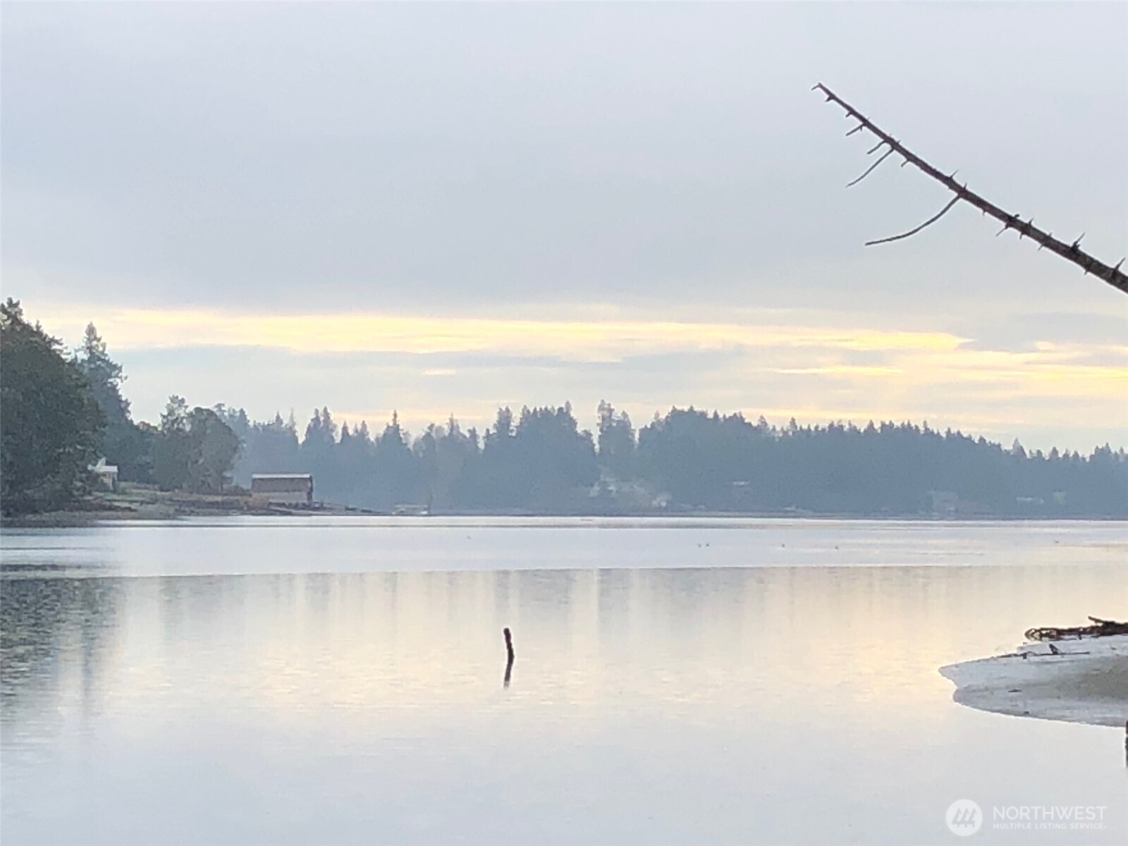 4101 161st Avenue Southwest Longbranch, WA 98351 - Photo 2 of 12 a view of a lake with mountain in the background