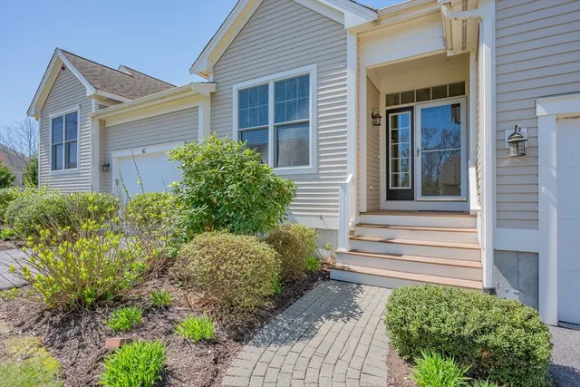 a small garden in front of a house