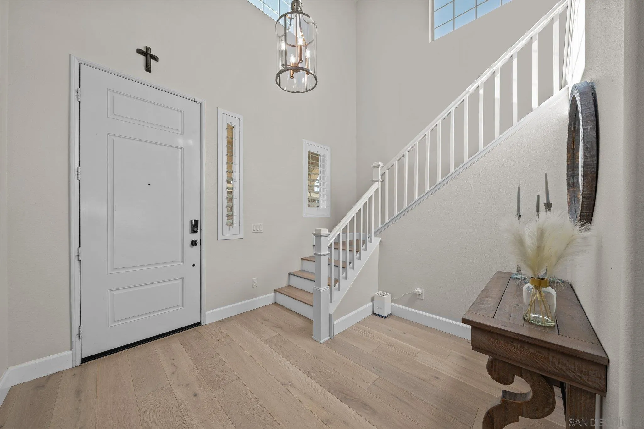35778 Esperia Way Fallbrook, CA 92028 - Photo 19 of 44 a view of entryway and hall with wooden floor