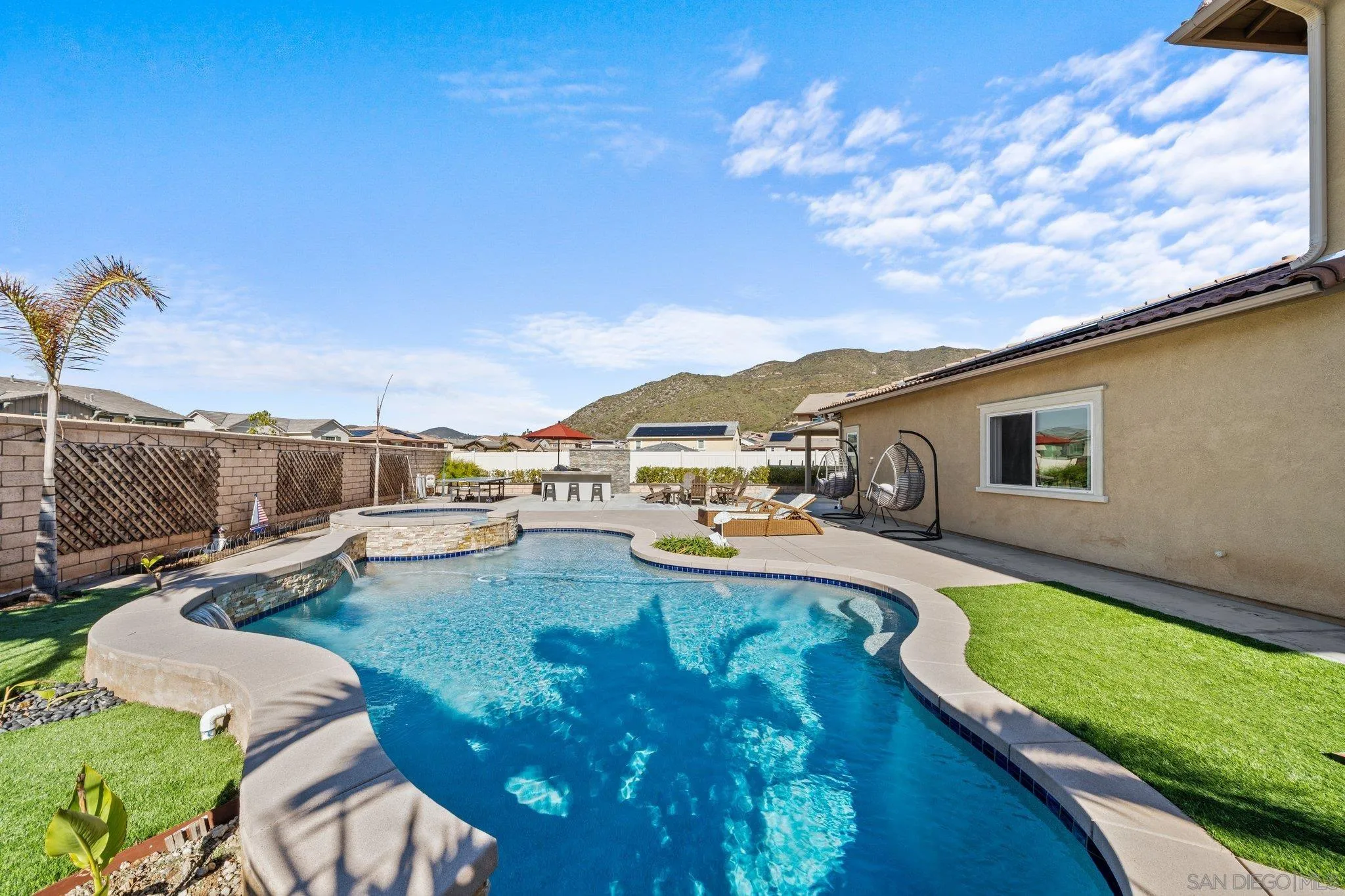 35778 Esperia Way Fallbrook, CA 92028 - Photo 2 of 44 a view of a house with swimming pool and sitting area