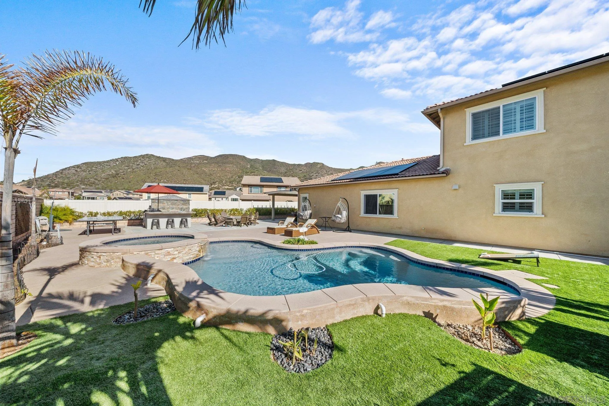 35778 Esperia Way Fallbrook, CA 92028 - Photo 3 of 44 a swimming pool with outdoor seating and yard