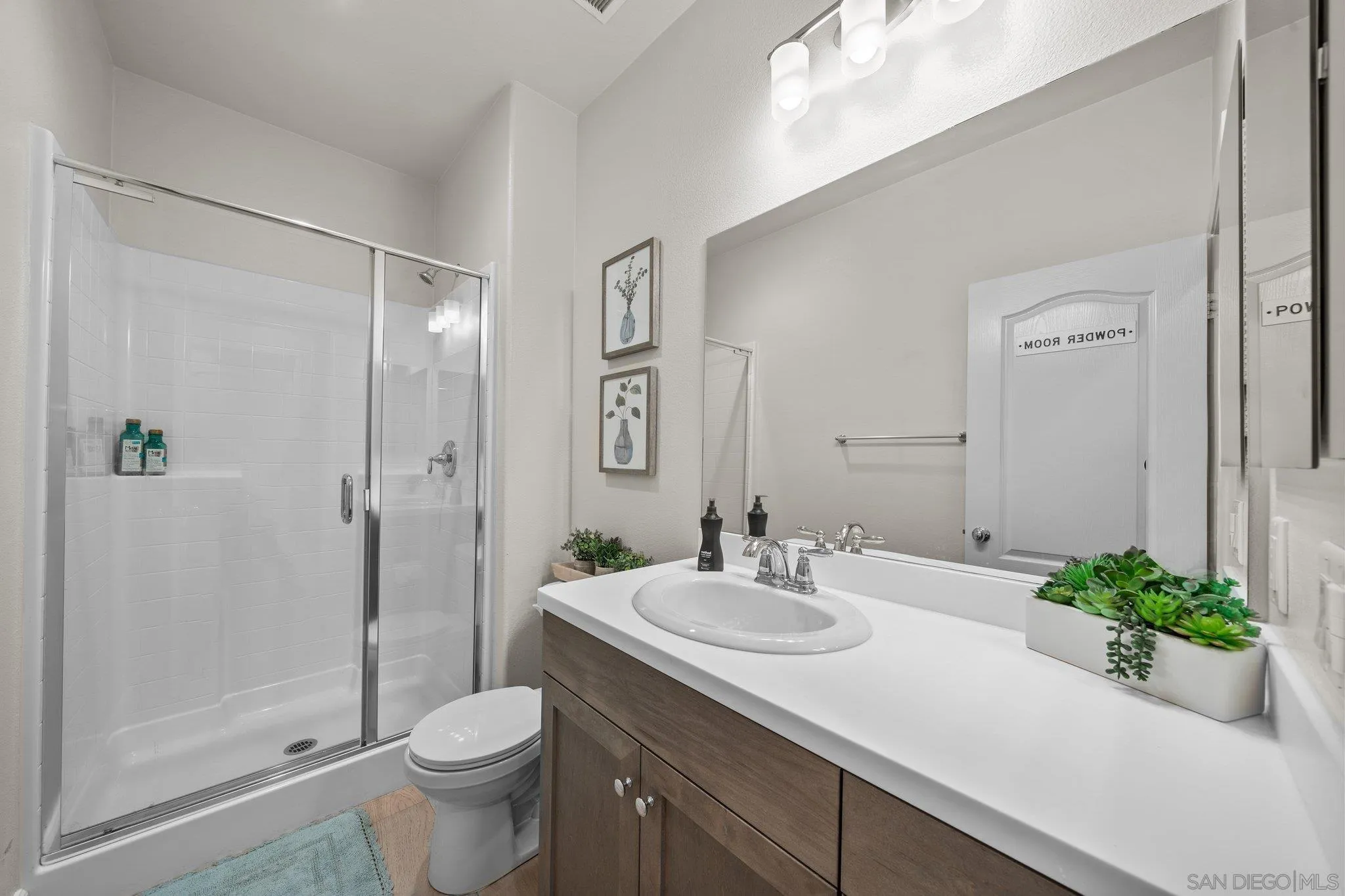 35778 Esperia Way Fallbrook, CA 92028 - Photo 31 of 44 a bathroom with a sink toilet and shower