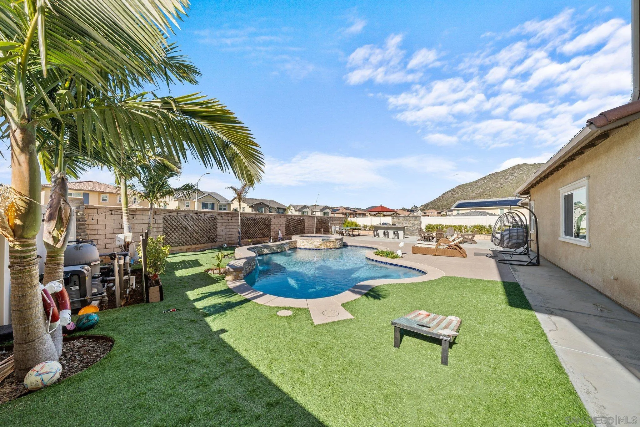 35778 Esperia Way Fallbrook, CA 92028 - Photo 4 of 44 a view of a backyard with swimming pool and furniture