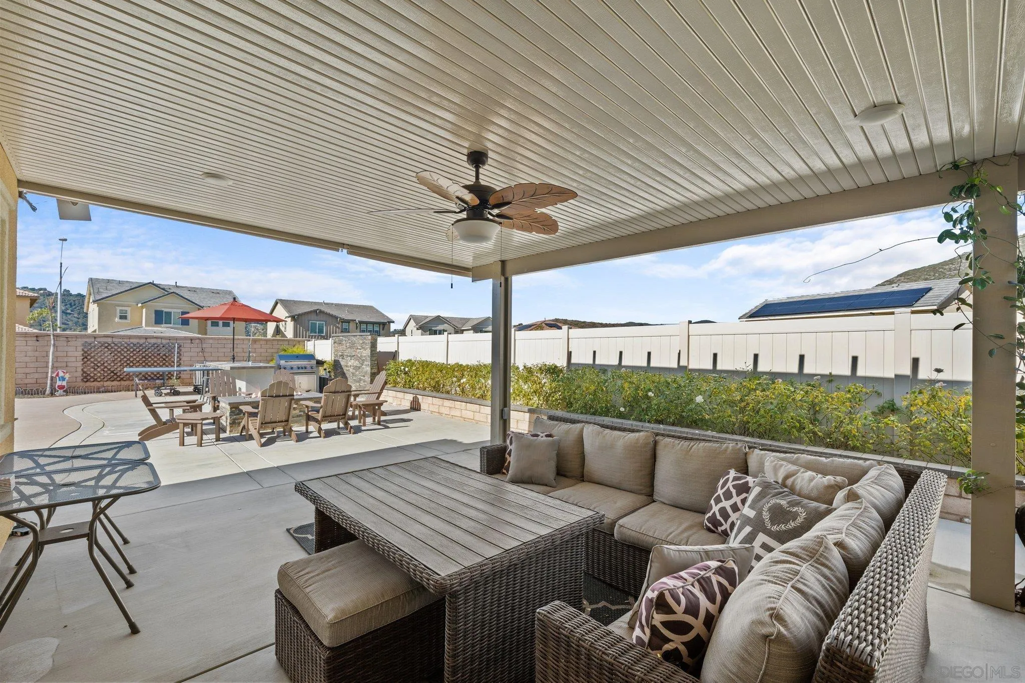 35778 Esperia Way Fallbrook, CA 92028 - Photo 42 of 44 a view of a patio with a table and chairs