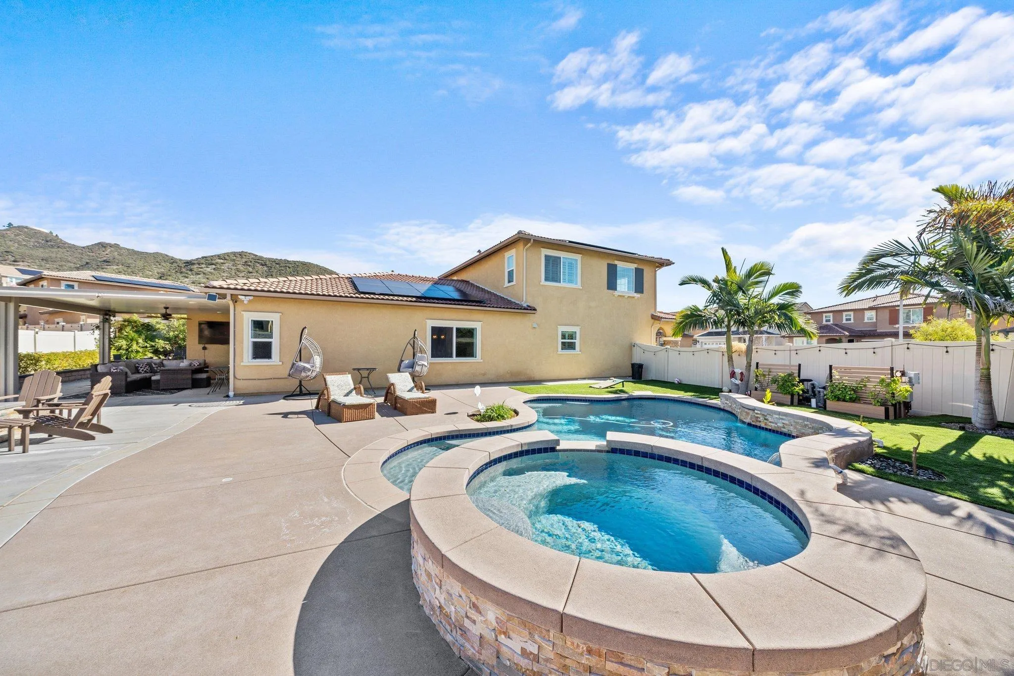35778 Esperia Way Fallbrook, CA 92028 - Photo 5 of 44 a view of a house with swimming pool and sitting area
