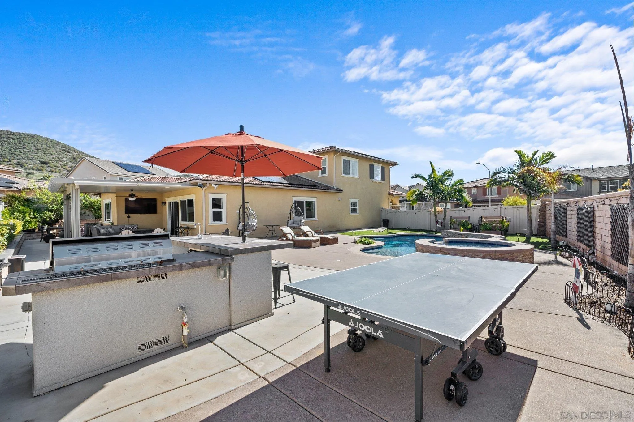 35778 Esperia Way Fallbrook, CA 92028 - Photo 6 of 44 a patio with a table and chairs