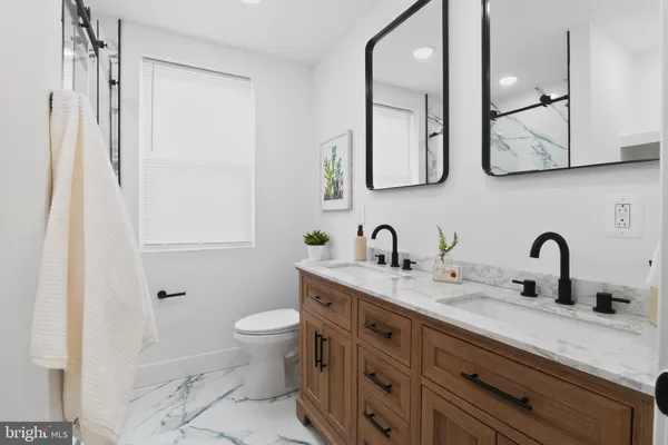 a kitchen with sink and cabinets