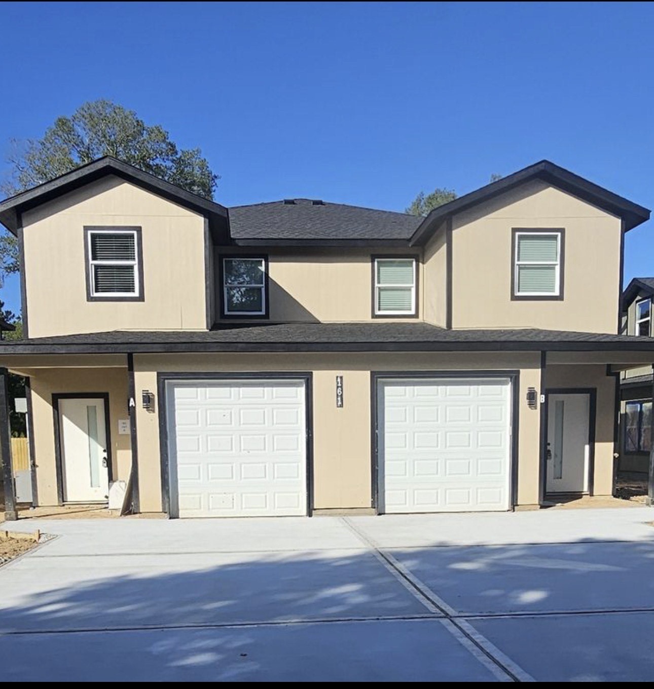 169 South 10th Street Conroe, TX 77301 - Photo 3 of 42 a view of a house with a outdoor space